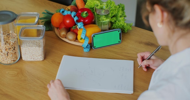 A person reading the nutrition label of a product, focusing on the ingredients list highlighting artificial sweeteners, with a concerned expression, symbolizing increased consumer awareness and scrutiny of food labels.
