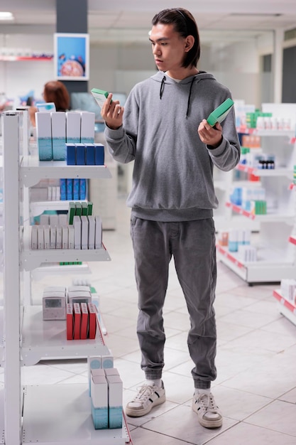 A pharmacist standing behind a counter, organizing different types of flu vaccines, with labels clearly visible. The setting is well-lit and professional, emphasizing the availability of various vaccine options.