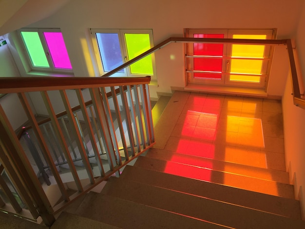An infrared image showing heat loss around windows and doors in a home, highlighting the need for improved insulation.