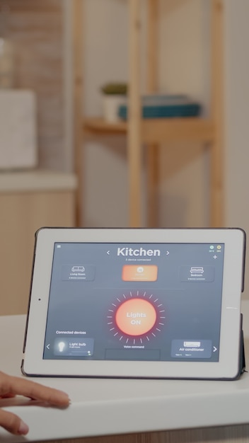 A close-up of a smart thermostat displaying energy usage data, highlighting the potential savings and control available to homeowners.