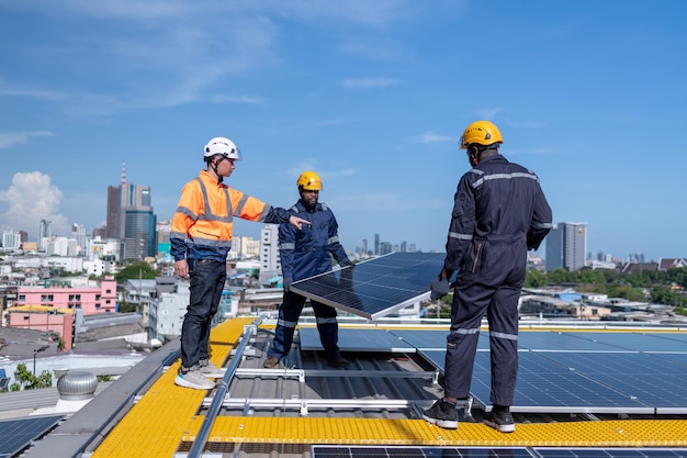 A group of construction workers installing large solar panels on a commercial rooftop, with a focus on the teamwork and technical expertise involved in renewable energy projects. The image highlights the human element of the renewable energy transition.