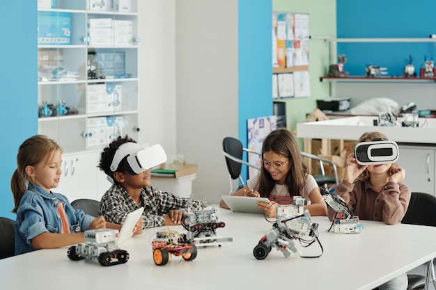 A classroom scene with students learning about robotics and artificial intelligence, highlighting the importance of STEM education.