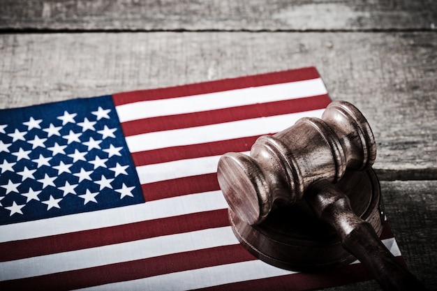 An image showing a gavel hitting a surface in the US Capitol, symbolizing the negotiations and political debates surrounding the debt ceiling.